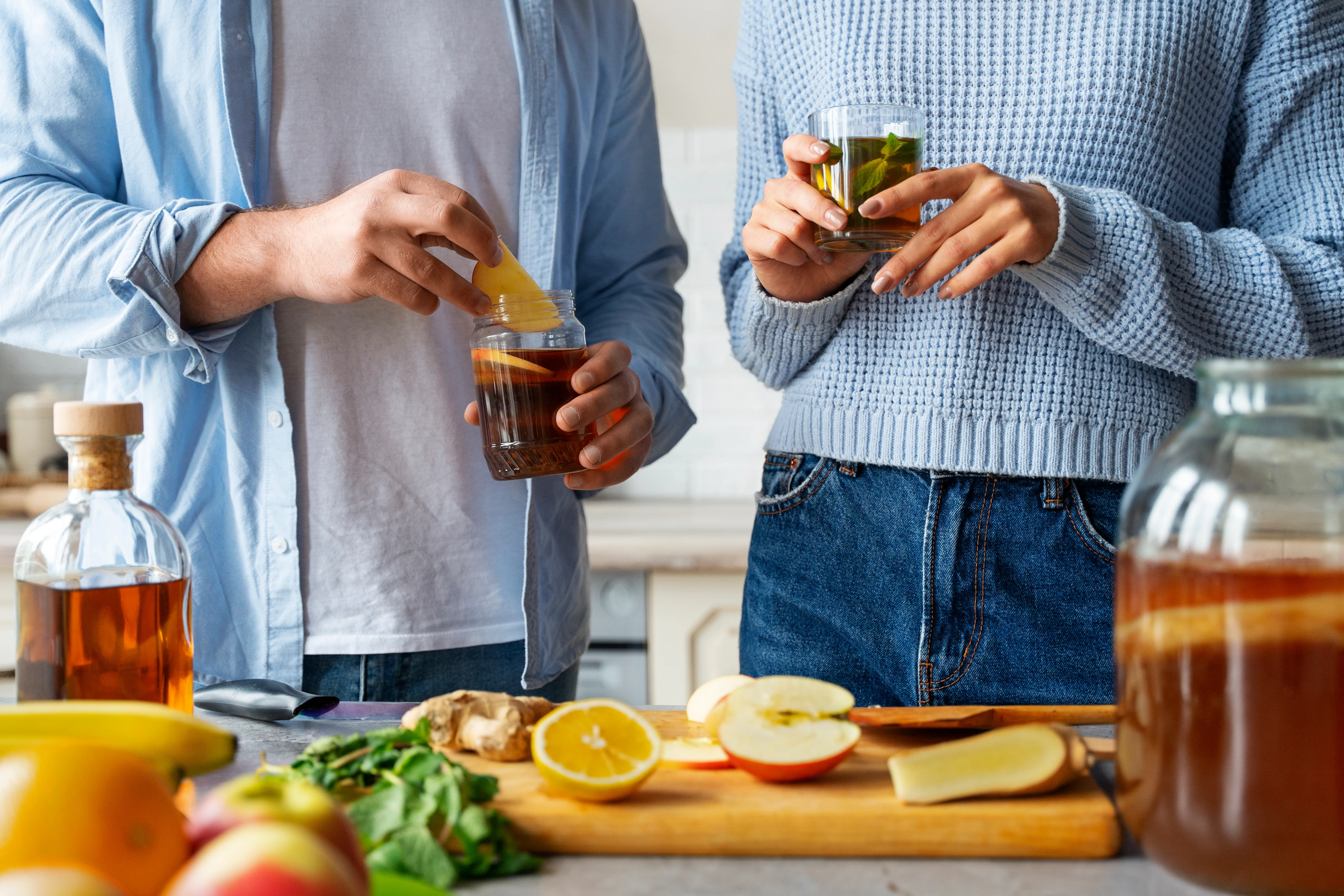 front-view-people-preparing-kombucha